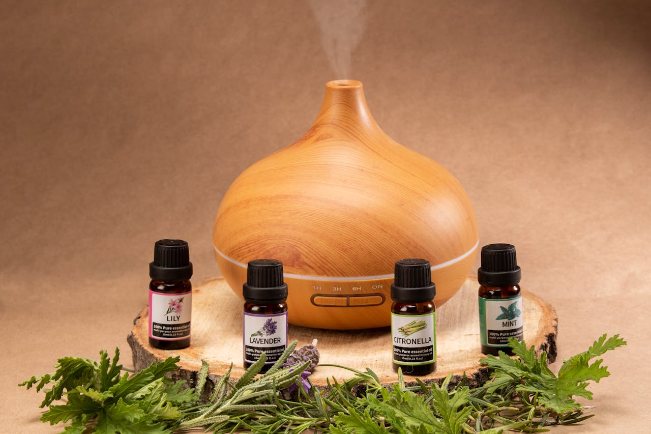 services-02 Wooden diffuser with essential oils, perfect for relaxation and aromatherapy needs.